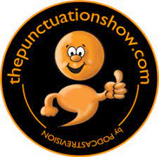 The Punctuation Show logo featuring a smiling orange character giving a thumbs-up, with a black circular background and yellow text.  